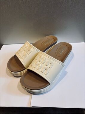 Unisa Cream Slide Sandals with Brown Footbed